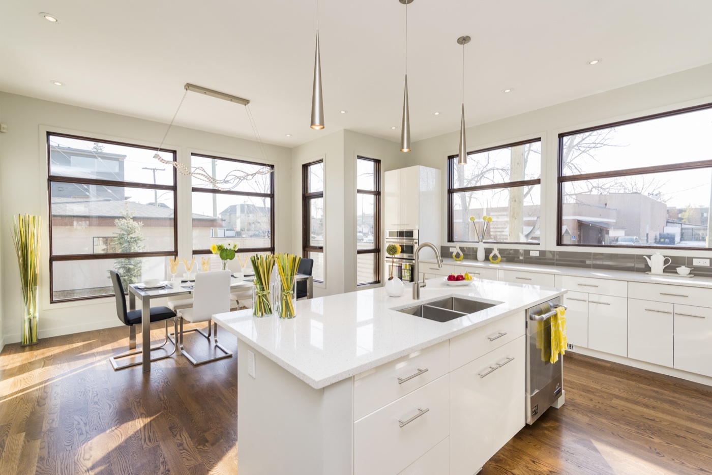 Bright modern kitchen with fresh white and soft grey painted surfaces